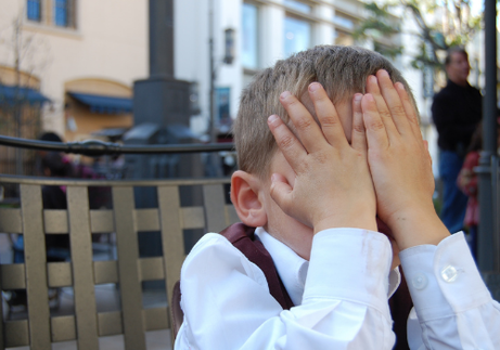 Late-Diagnosed ADHD & Shame: Healing the Unseen Wounds 3 little boy covering his face