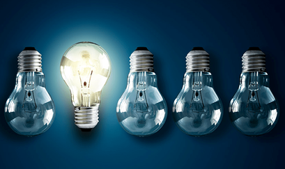 Image of five lightbulbs and only one is lit