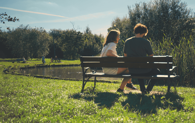 talking on park bench